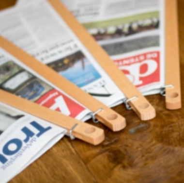 Kranten in krantenstok